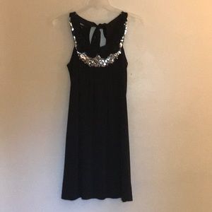 Black shift dress with embellished neckline